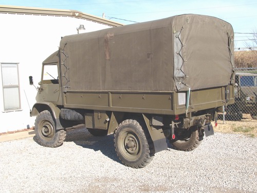 Swiss Army Service Unimog. With softtop covering
s ..