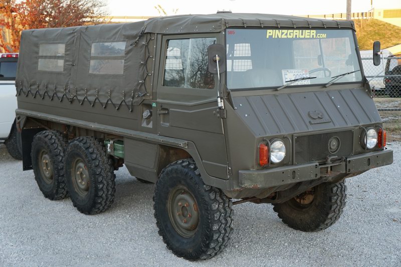 Swiss Army Troop Carrier with 6 rear bench seats.  ..