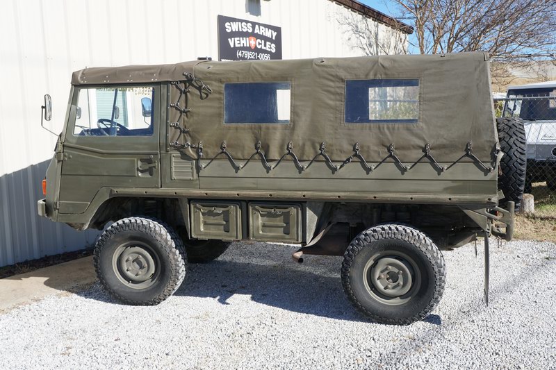 Swiss Army Troop Carrier with 4 rear seats.   Good ..