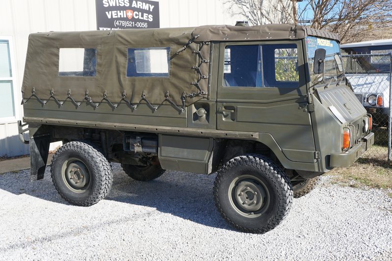 Swiss Army Troop Carrier with 4 rear seats.   Good ..